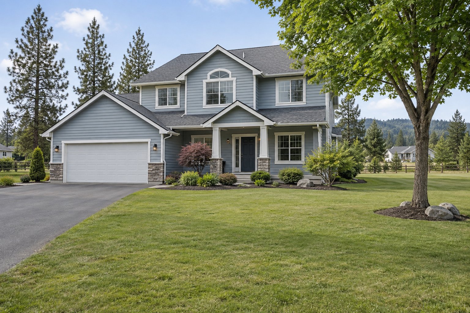 Illustration: Blue-gray two-story home with a broad lawn and generous spacing from neighboring homes